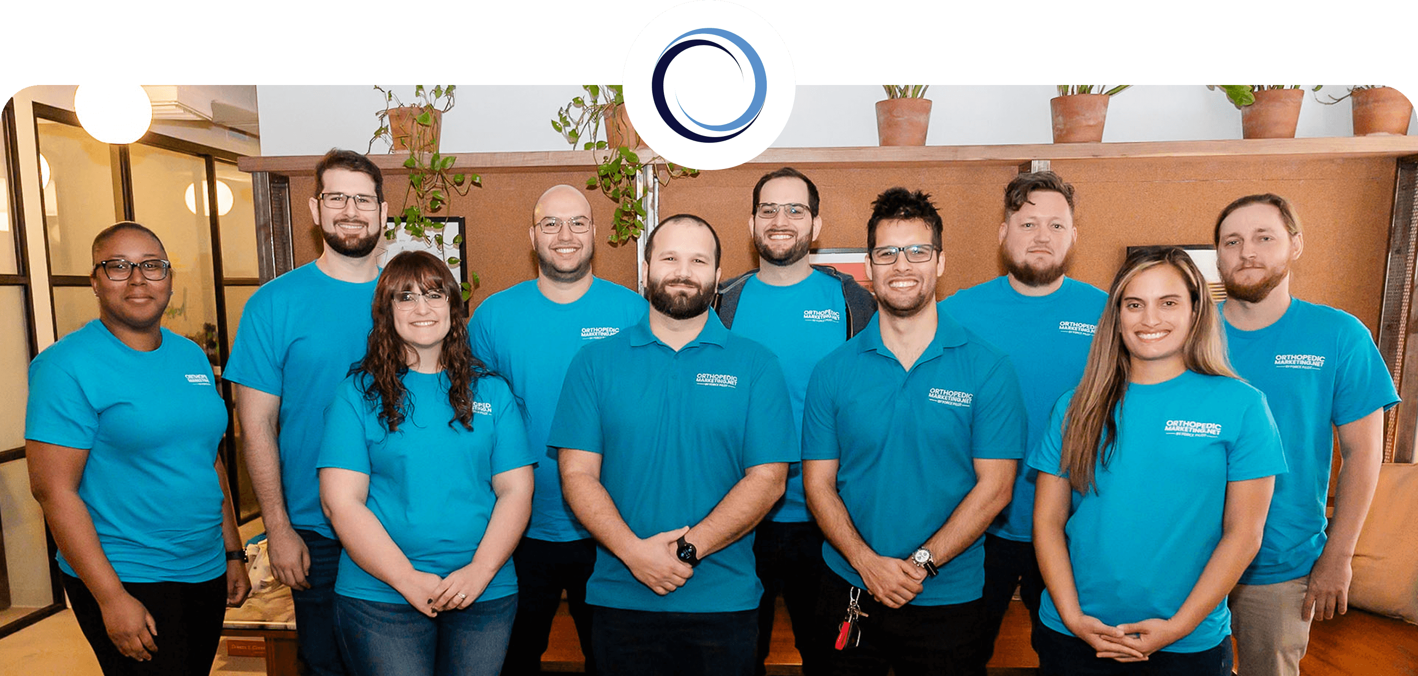 Meet the OrthopedicMarketing.net Team, Specialists in PT and Orthopedic Clinic Growth The OrthopedicMarketing.net team standing together, helping orthopedic and PT clinics grow with expert digital marketing.