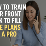 Front desk receptionist booking physical therapy care plans on phone and laptop